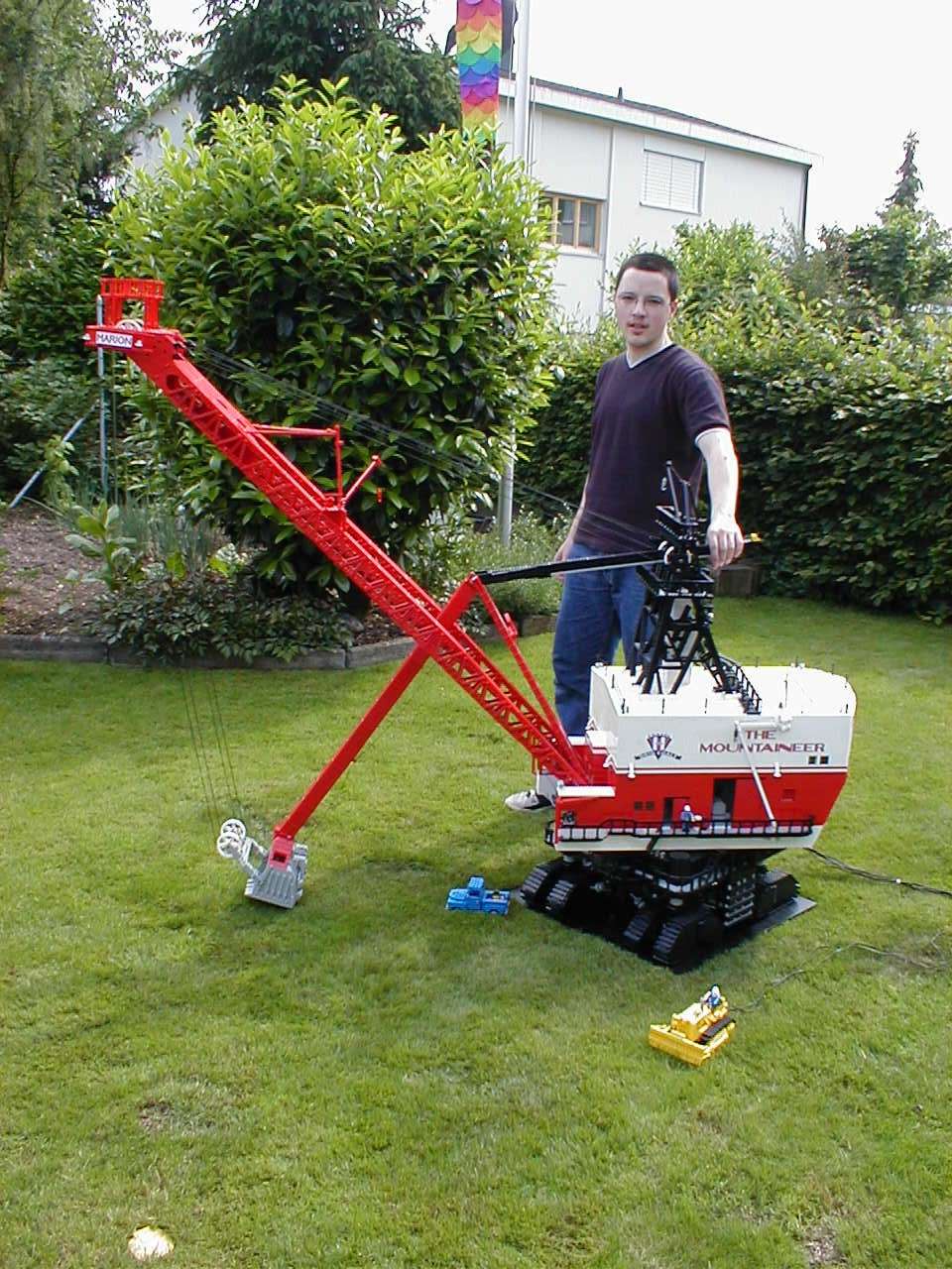 This epic LEGO coal mining shovel is nearly as tall as its builder